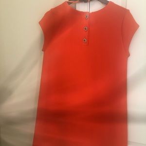 Mini dress with jeweled buttons